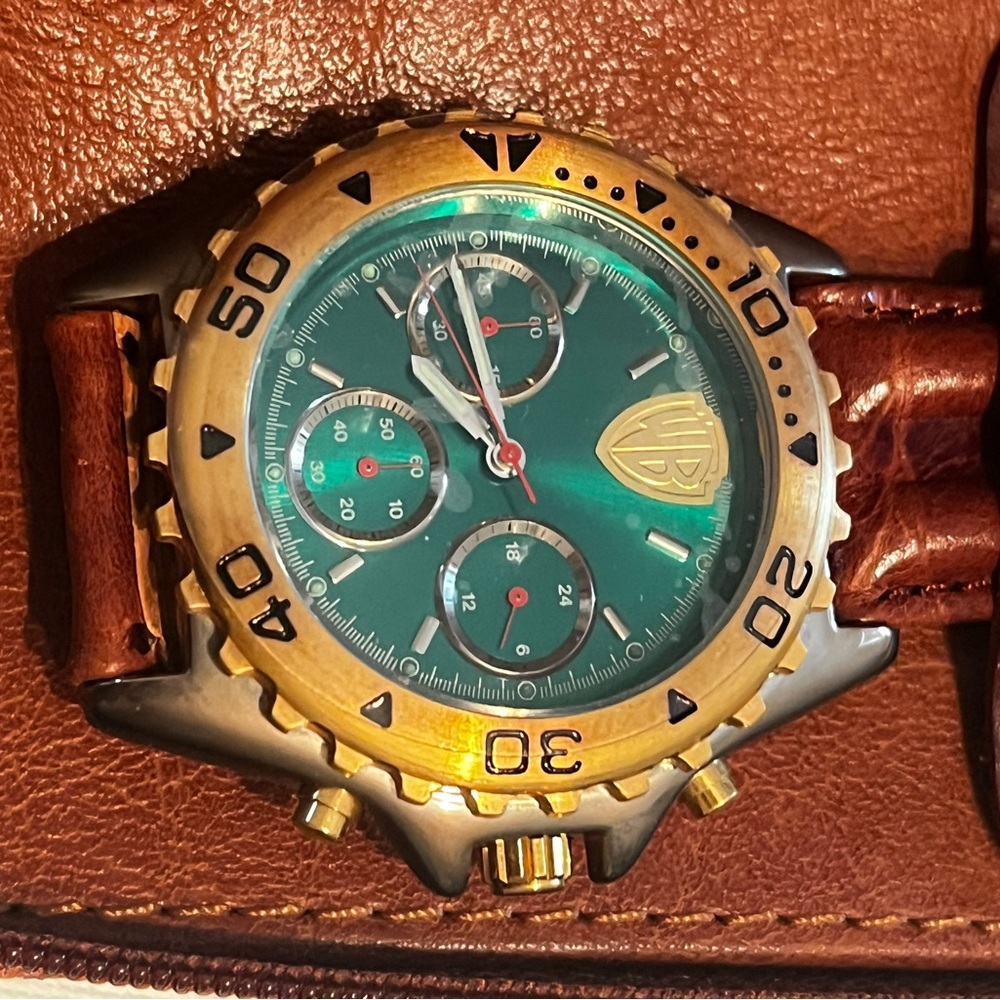 Elegant Gold and Green Chronograph Watch